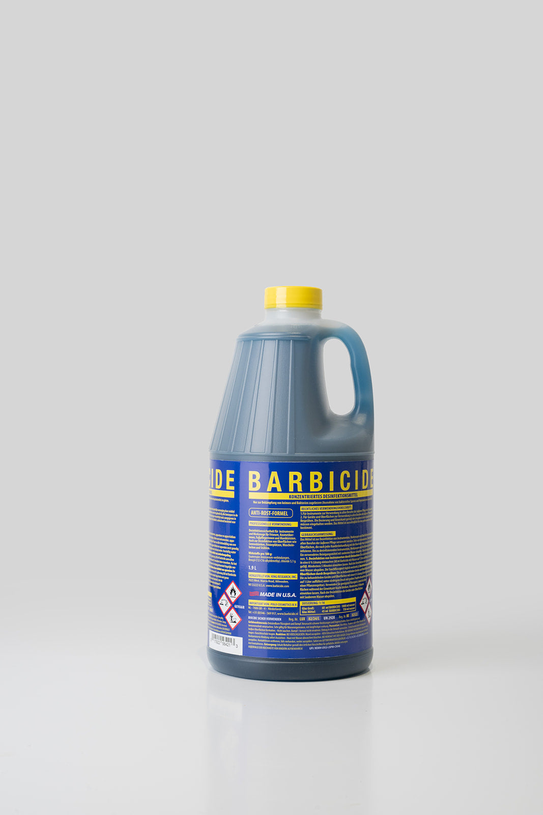 Barbicide desinfectie concentraat, blauwe fles met gele dop